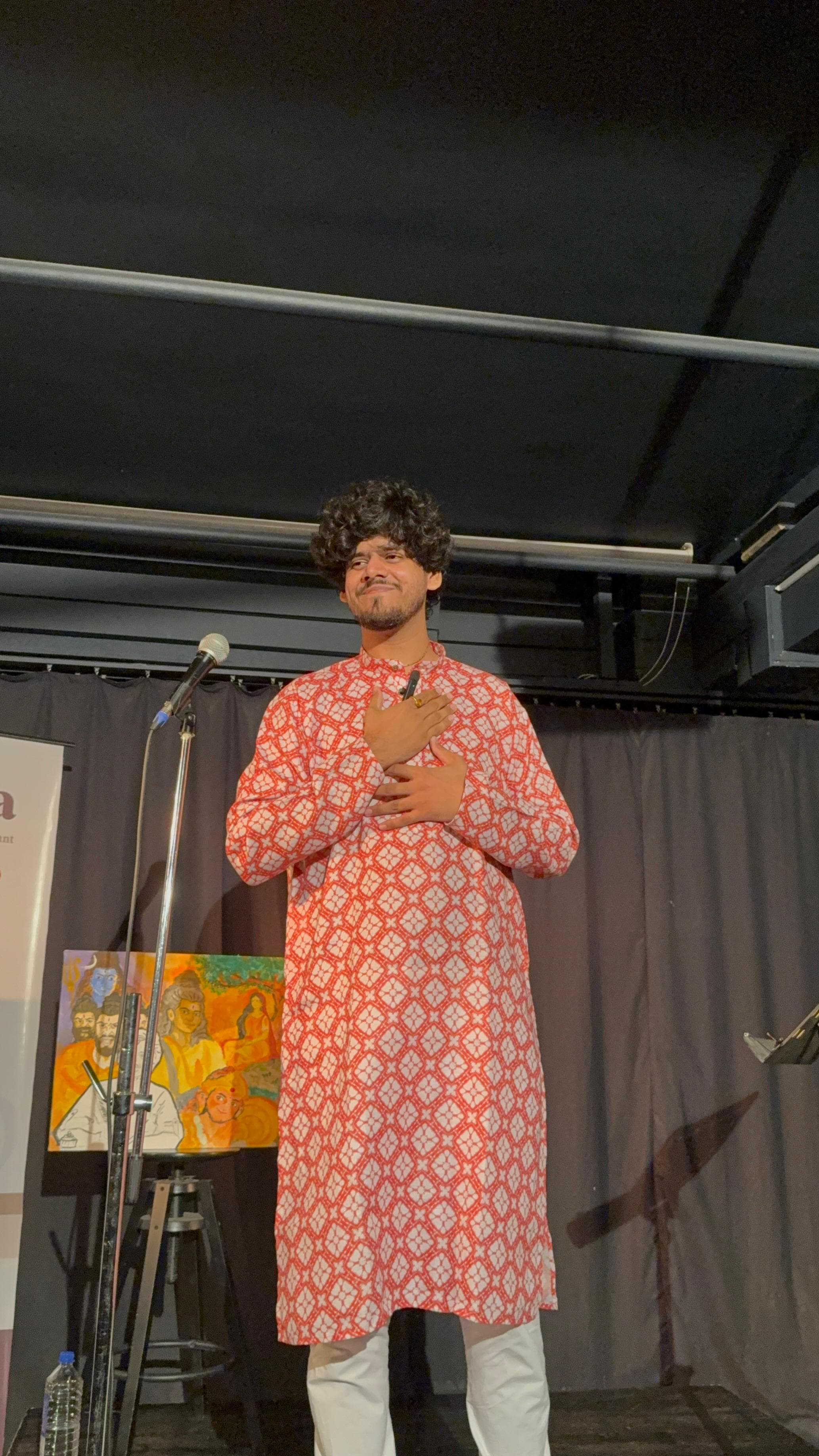 Badal performing Rameshwaram in a red and white kurta
